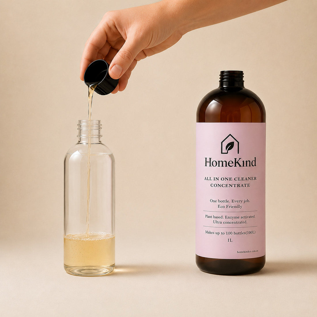 HomeKind concentrate being measured into a spray bottle