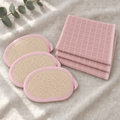 HomeKind Refresh Pack, three waffle cloths and three scrubby sponges on linen